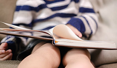 child reading a book